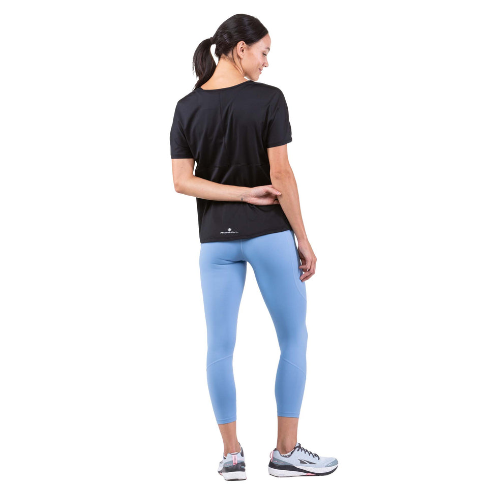 Back view of a model wearing a Ronhill Women's Tech Glide S/S Tee (7744876183714)