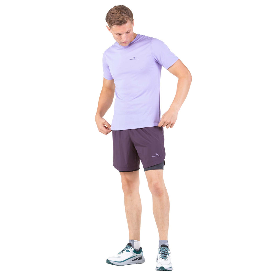 Front view of a model wearing a Ronhill Men's Core S/S Tee (7743599771810)