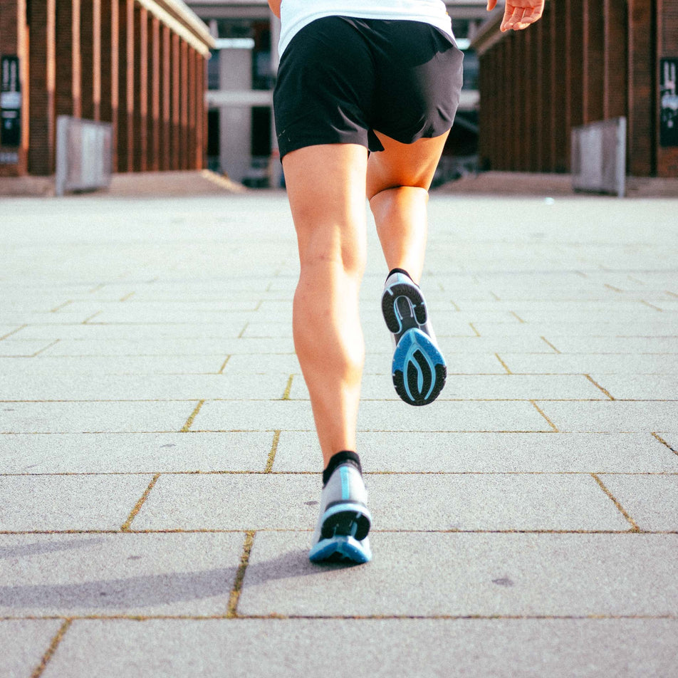 Posterior running view of women's true motion u-tech solo running shoes (7373851689122)