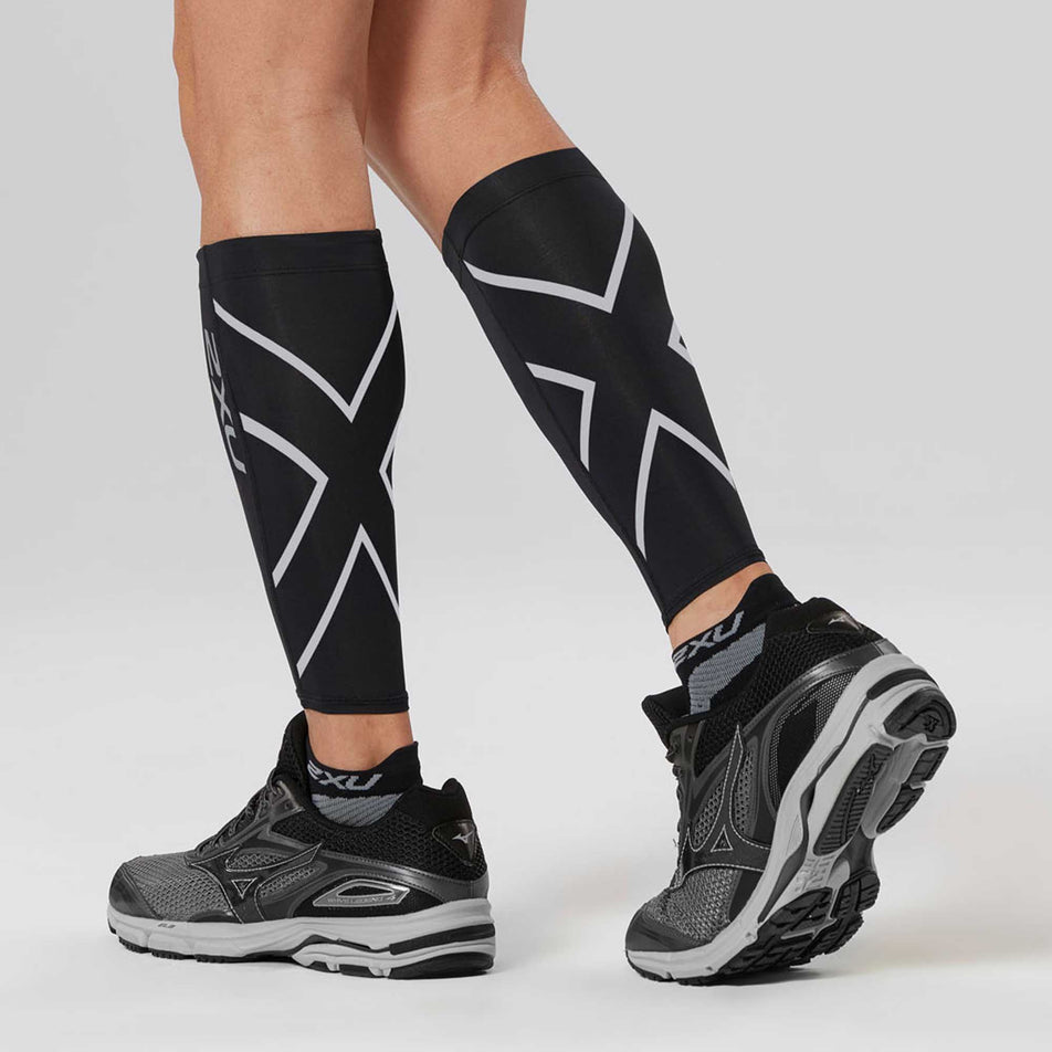 Behind view of unisex 2XU compression Calf Guards (6959097938082)