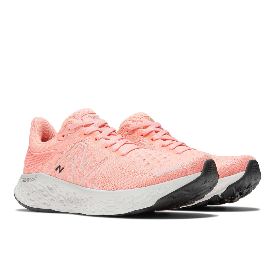 Pair anterior angled view of New Balance Women's Fresh Foam 1080v12 Running Shoes in pink. (7725351272610)
