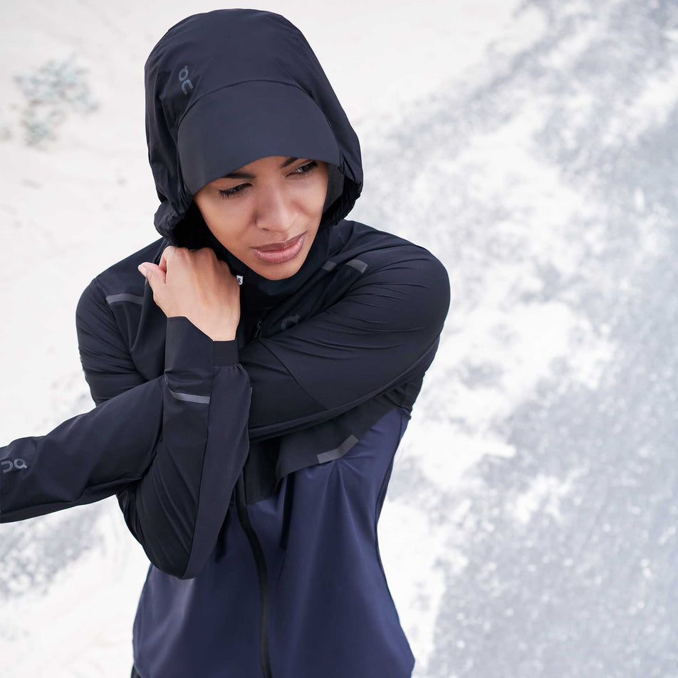 Model Stretching View of Women's On Weather Jacket (6910381883554)