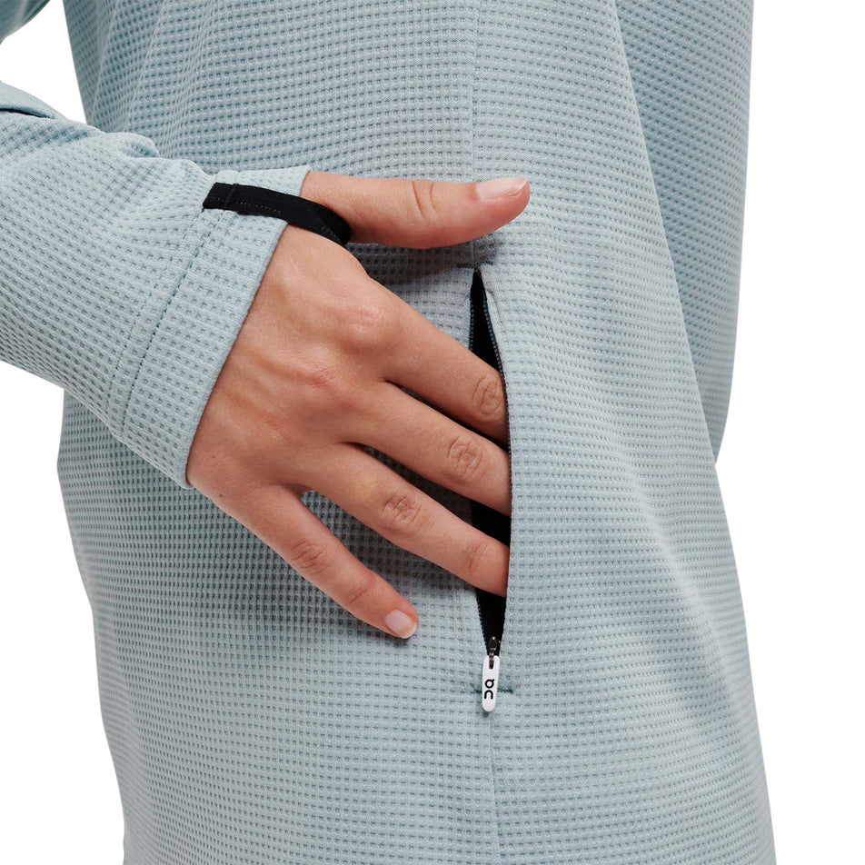 Side pocket view of women's on climate shirt (7372713001122)