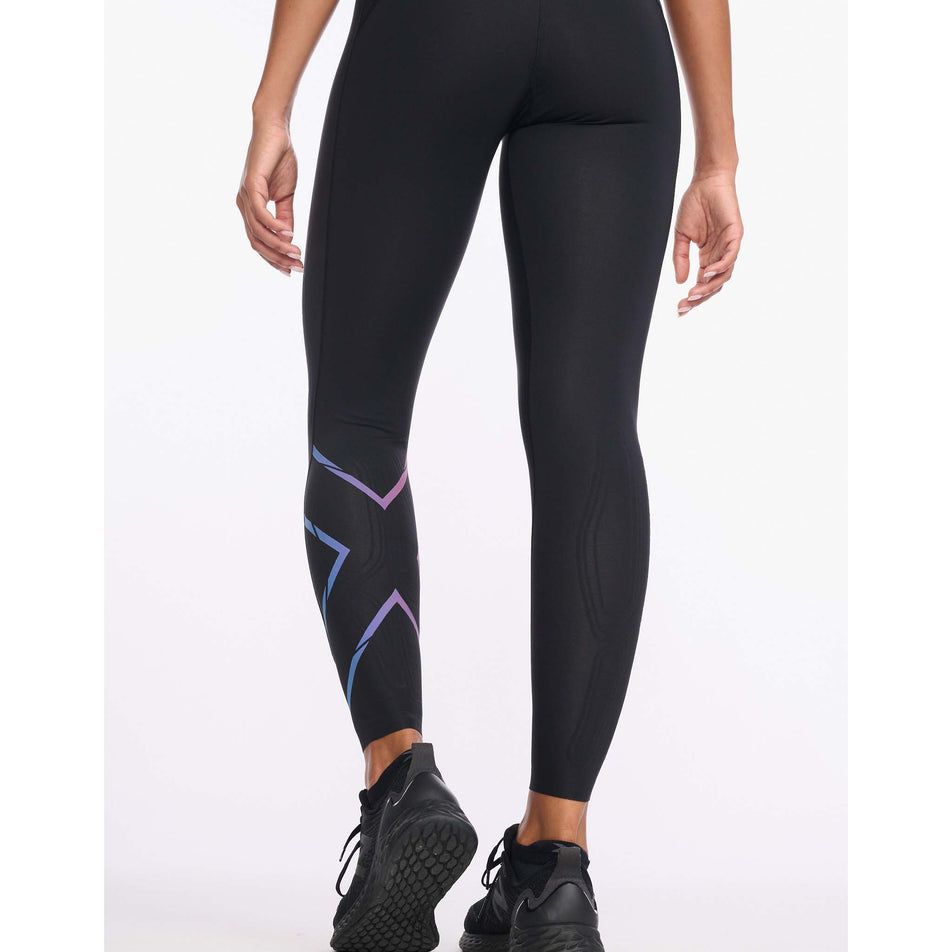 Behind view of women's 2xu light speed mid-rise compression tights (7254472392866)
