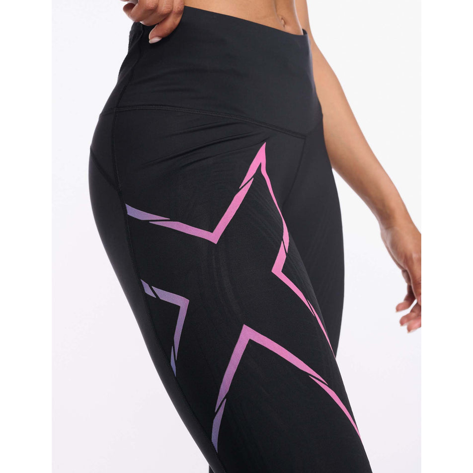 Side view of women's 2xu light speed mid-rise compression tights (7254472392866)