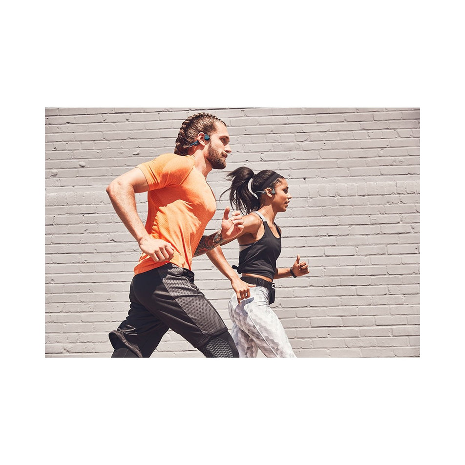 Side  running view of unisex aftershokz trekz air wireless bone conduction headphones (7074142650530)